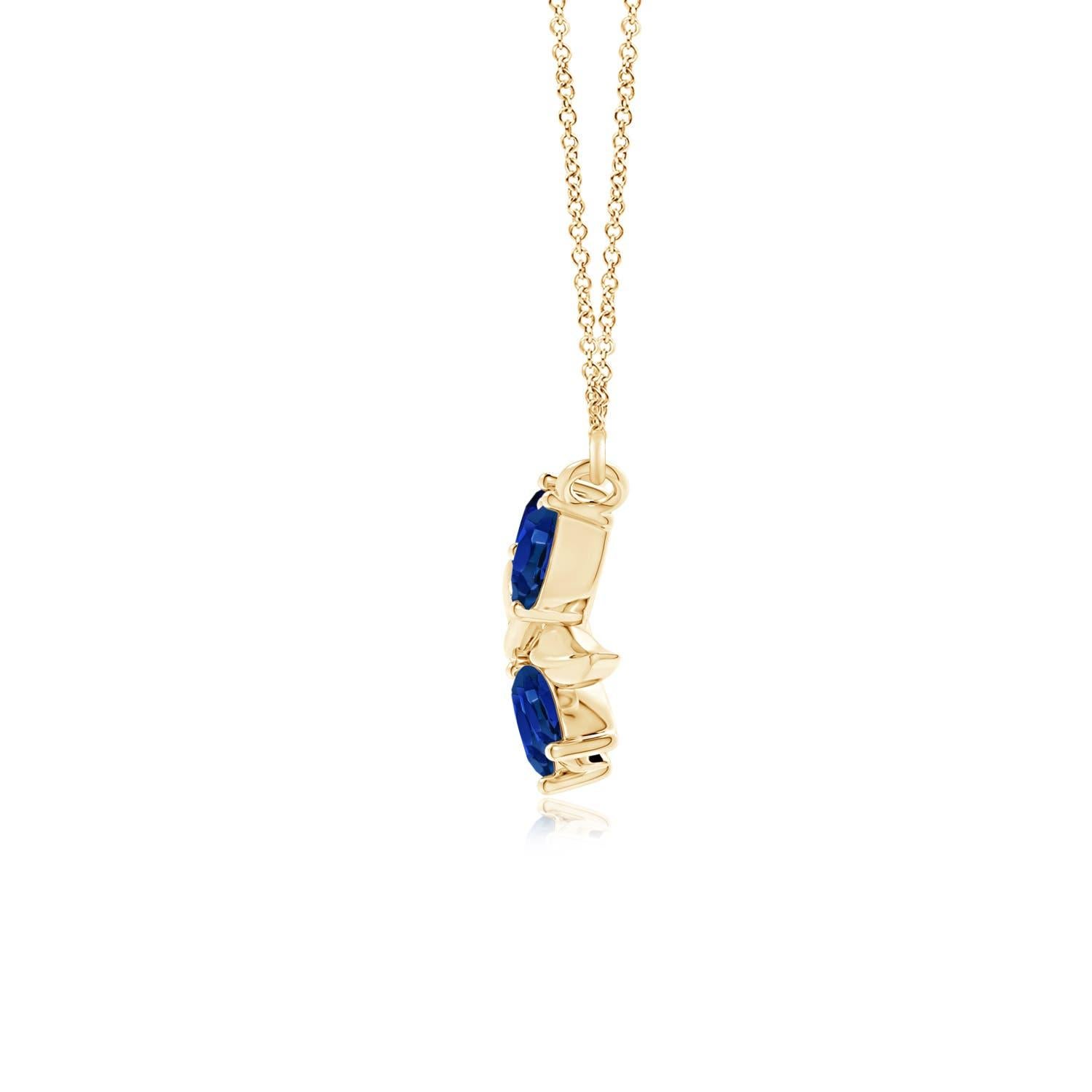 Elegantemente disegnata a forma di ramo d'ulivo con zaffiri a forma di marquise e pera incastonati e motivi di foglie lucide, questa collana è un'ode alla bellezza della natura. La disposizione alternata delle incantevoli gemme blu e delle foglie