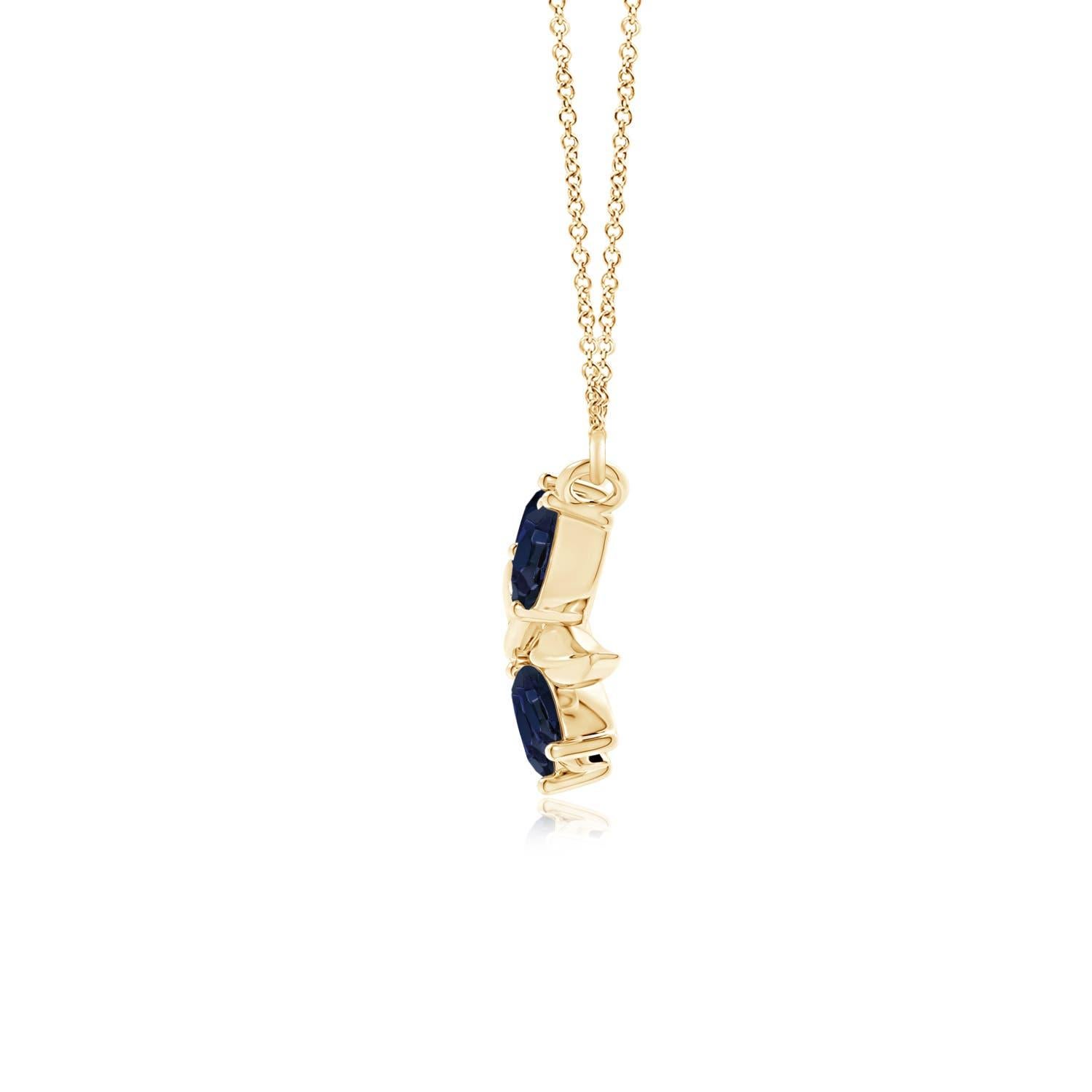 Elegantemente disegnata a forma di ramo d'ulivo con zaffiri a forma di marquise e pera incastonati e motivi di foglie lucide, questa collana è un'ode alla bellezza della natura. La disposizione alternata delle incantevoli gemme blu e delle foglie