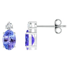 Angara Natural Oval 1 ct Tanzanite Stud Earrings with Diamond in 14K Solid Gold