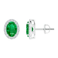 Angara - Boucles d'oreilles émeraude ovale naturelle de 1,32 ct avec halo de diamants en or 14K