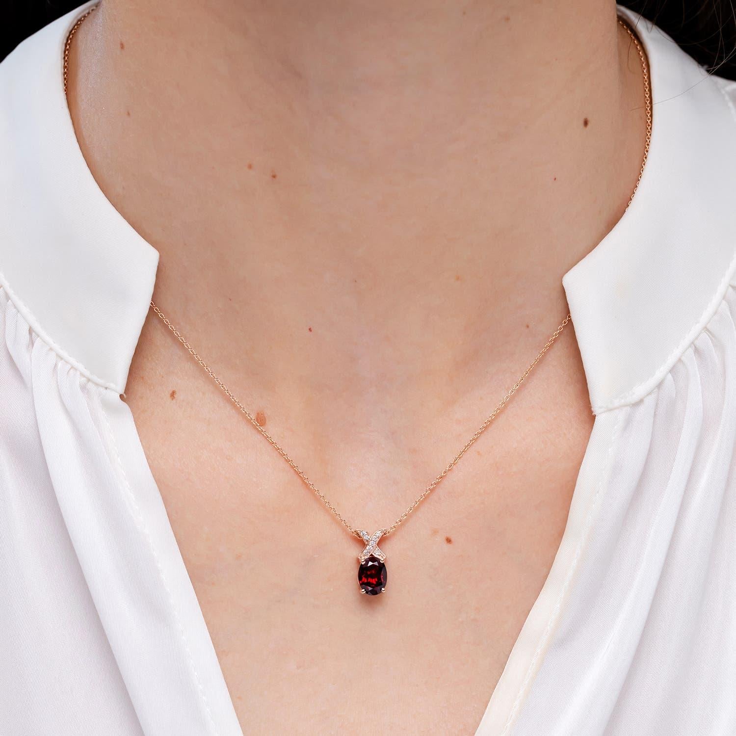 Modern Angara Natural Oval 1.45 ct Garnet XO Pendant with Diamonds in 14K Solid Gold For Sale
