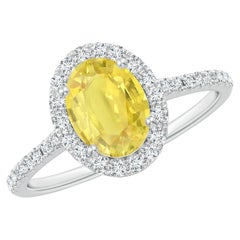 Anello aureolato con zaffiro giallo ovale da 1,5 carati di Angara e diamanti in oro 14K