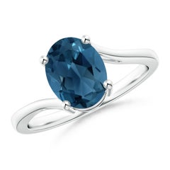Angara Natural Oval 2.25 ct London Blue Topaz Solitaire Ring in 14K Solid Gold