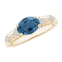 Anello Angara con Topazio Blu di Londra ovale naturale da 2,25 carati e diamante in oro massiccio 14K