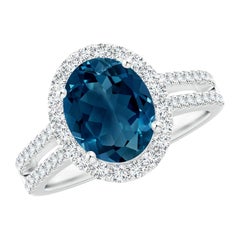 Anello Angara Oval 3,25 ct London Blue Topaz Split Shank Halo in oro 14 carati