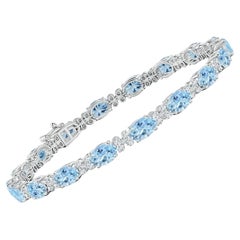 Angara Natural Oval 7.2 ct Aquamarine Tennis Bracelet with Diamonds in 14K Gold