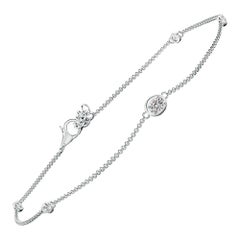 Bracelet en or 14 carats avec diamants ovales naturels et accents sertis sur lunette Angara