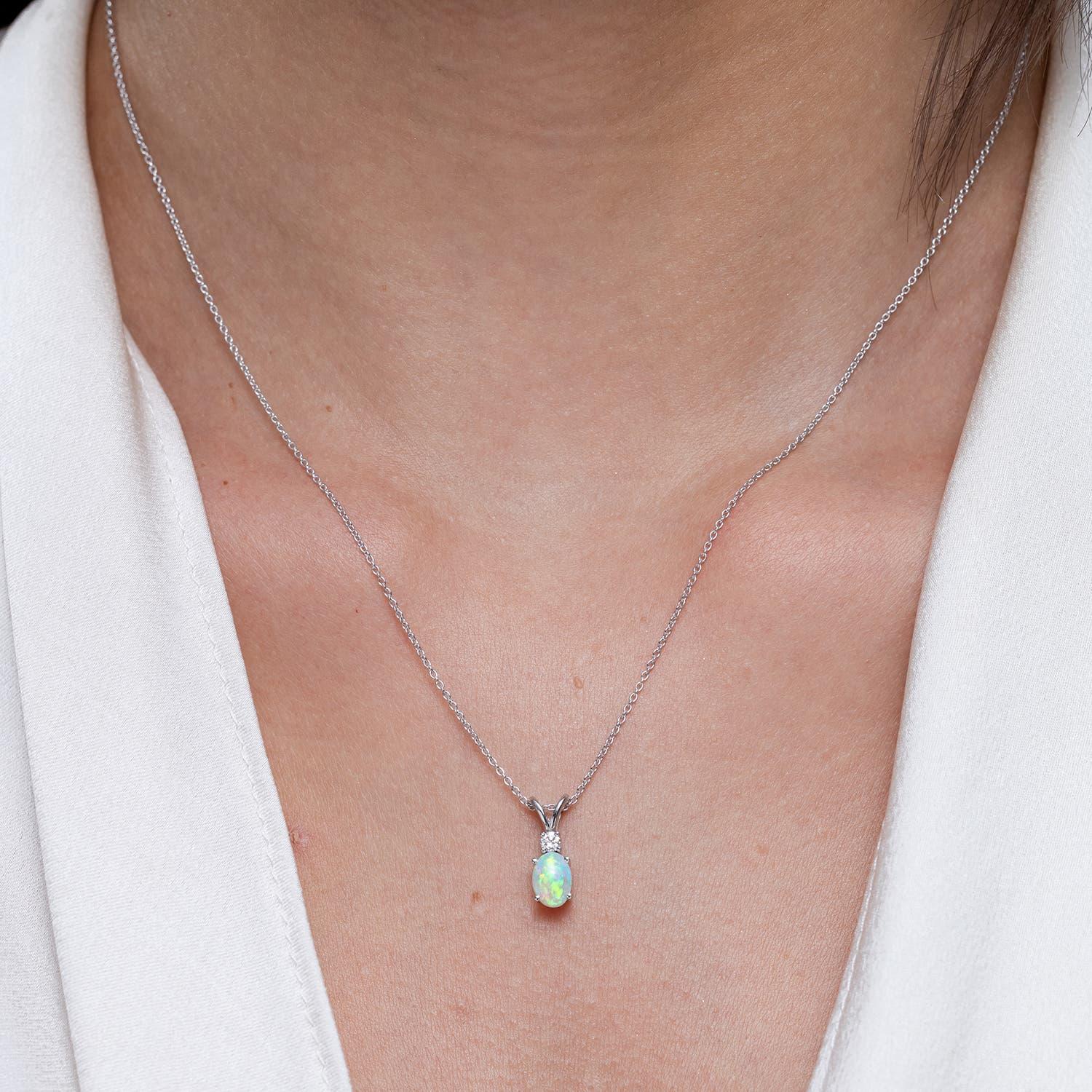 Modern Angara Natural Oval Opal V-Bale Pendant with Diamond Accent in 14K Solid Gold For Sale