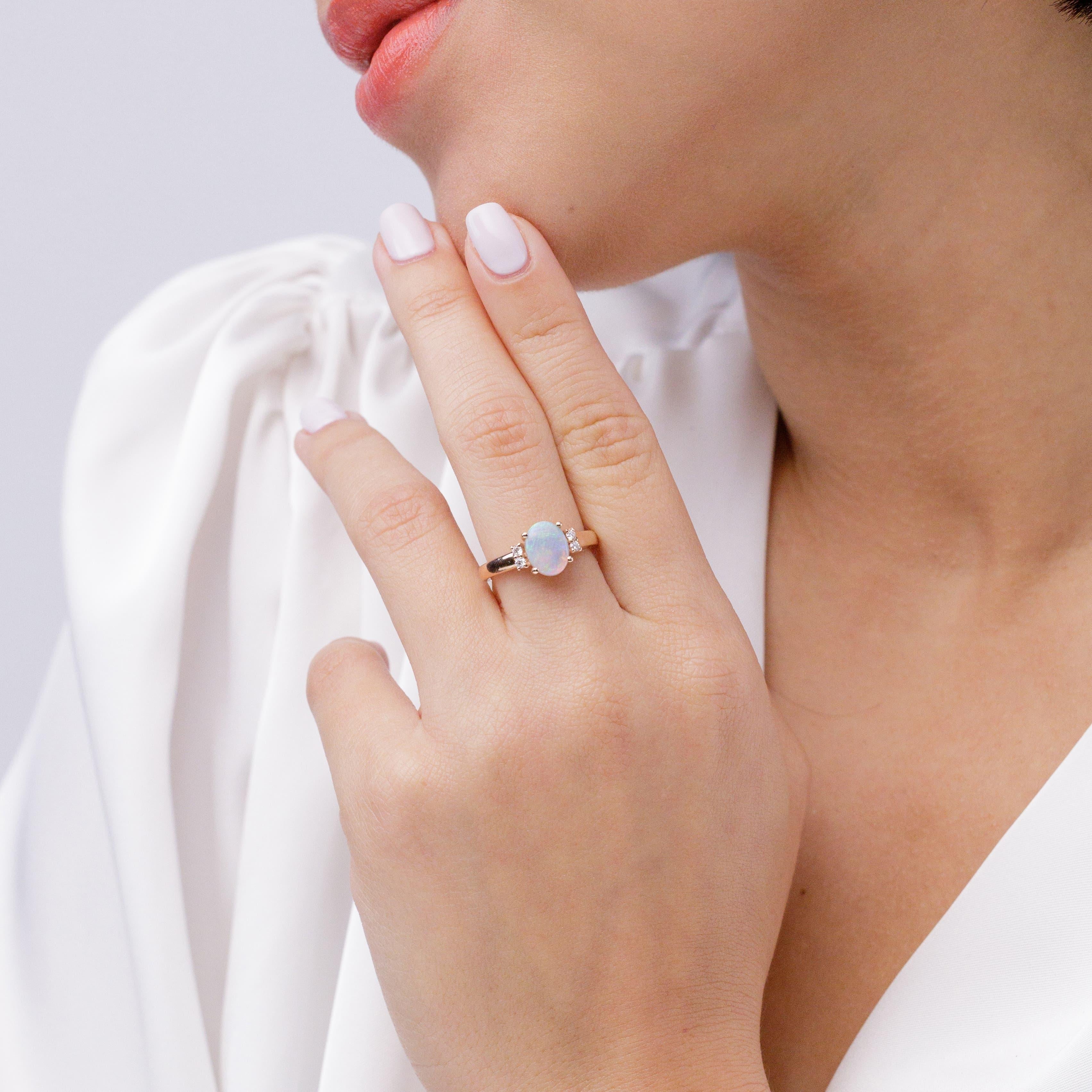 Modern Angara Natural Oval-Shape 1.1ct Opal Solitaire Ring with Diamond 14K Solid Gold For Sale