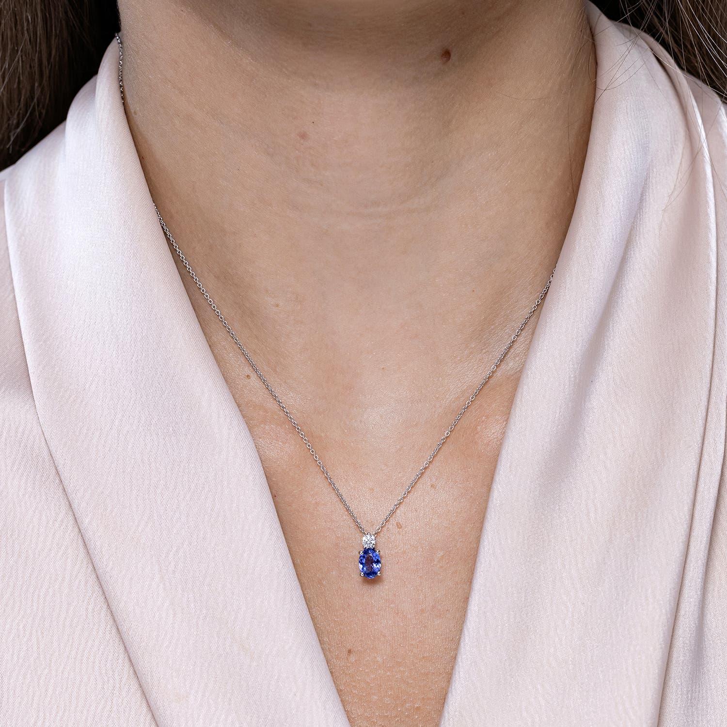 Modern Angara Natural Oval Tanzanite Solitaire Pendant with Diamond in 14K Solid Gold For Sale