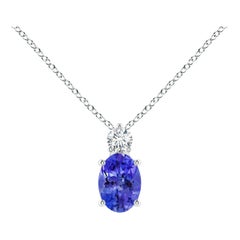 Ciondolo solitario di tanzanite ovale naturale di Angara con diamante in oro massiccio 14 carati