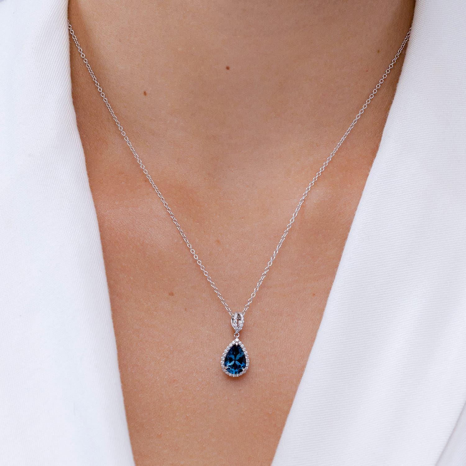 Modern Angara Natural Pear 2.3 ct London Blue Topaz Halo Pendant in 14K Solid Gold For Sale
