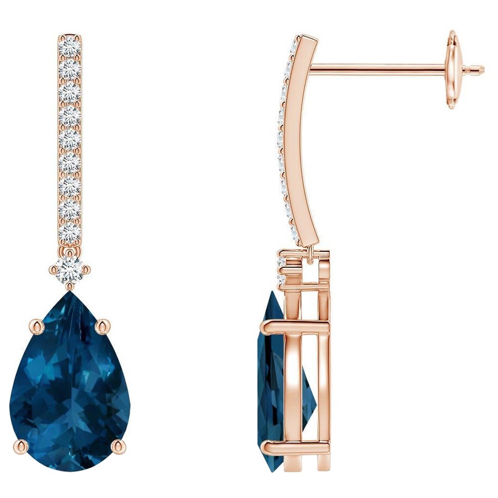 Boucles d'oreilles en or 14 carats pour femmes : Angara Natural Pear-Shaped 3.3ct London Blue Topaz en vente