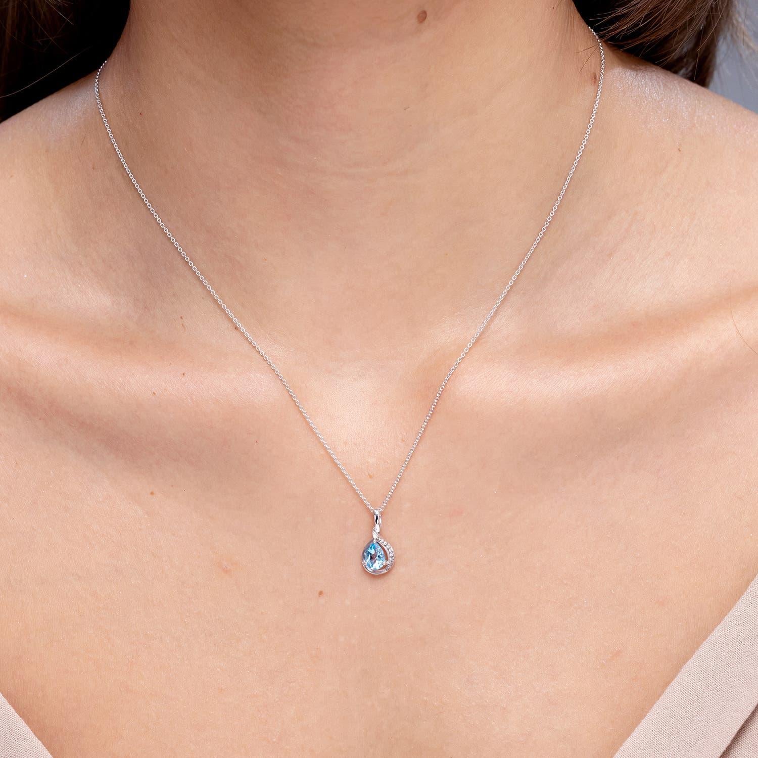 Modern Angara Natural Pear-Shaped Swiss Blue Topaz and Diamond Pendant in 14K Solid Gol For Sale