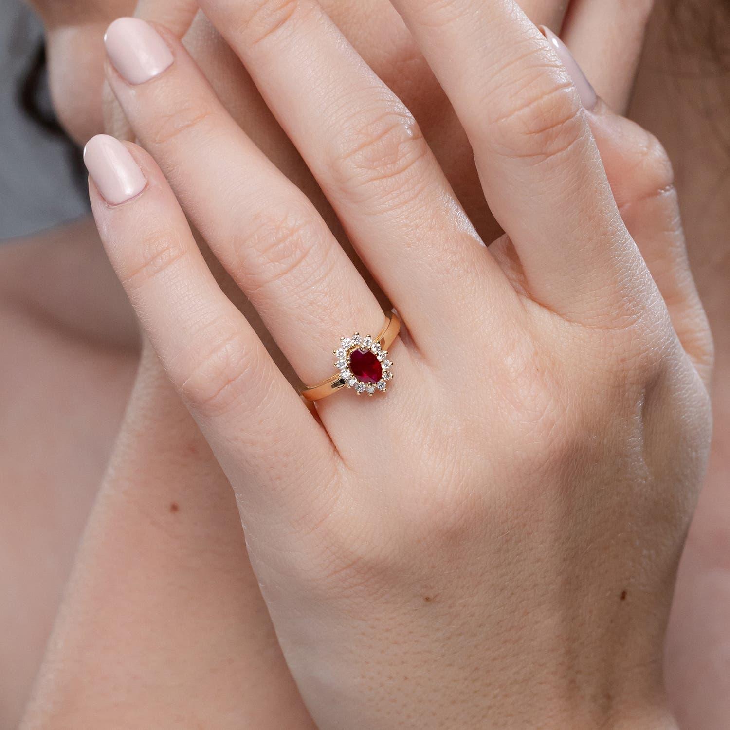 Oval Cut Angara Natural Princess Diana Inspired Ruby Ring with Diamond Halo in 14K Gold For Sale