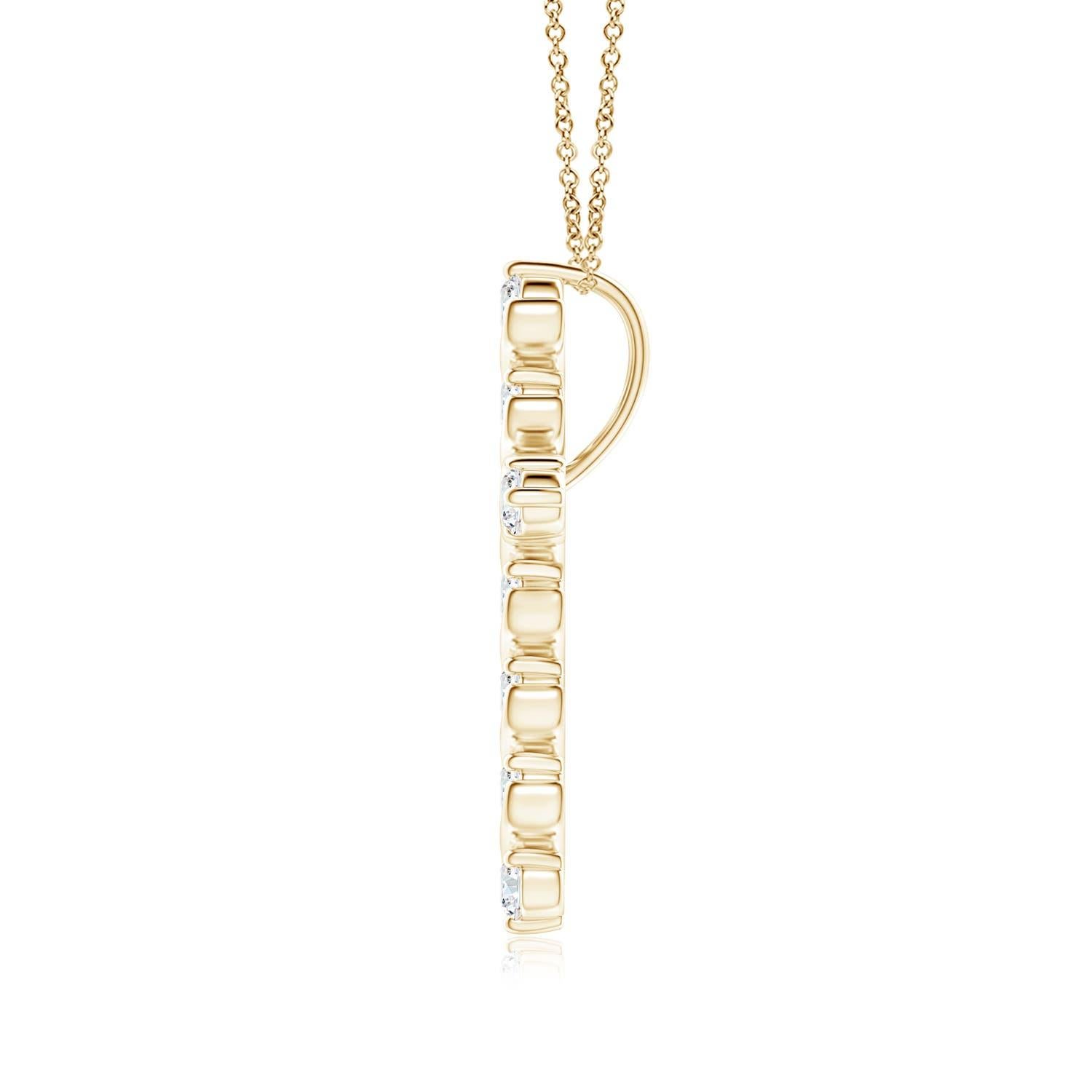 Dieser Kreuzanhänger aus 14-karätigem Gelbgold hat einen Hauch von fließender Eleganz und versprüht femininen Charme. Die Brillanten sind in einer einzigartigen Zacken- und Spangenfassung inmitten wirbelartiger Details befestigt und sorgen für einen