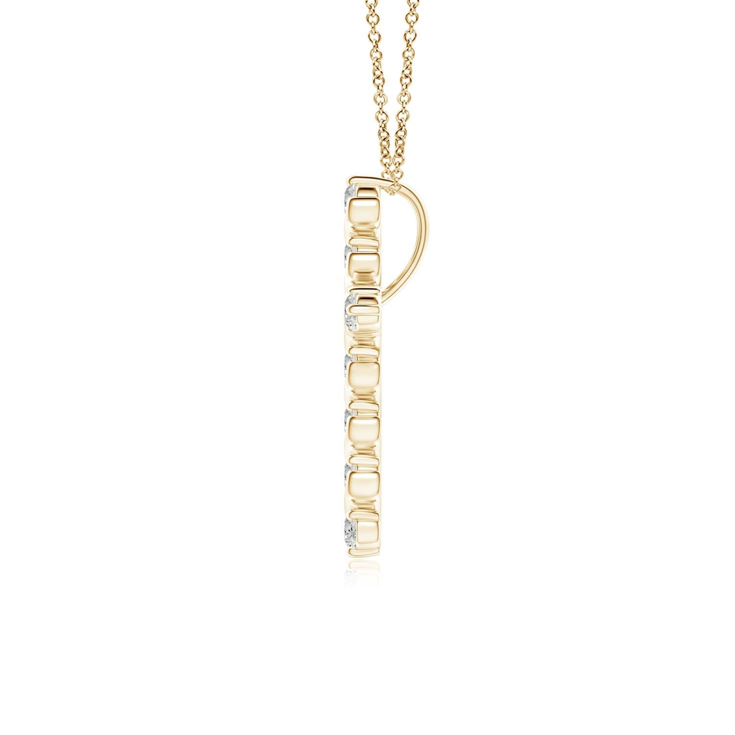 Dieser Kreuzanhänger aus 14-karätigem Gelbgold hat einen Hauch von fließender Eleganz und versprüht femininen Charme. Die Brillanten sind in einer einzigartigen Zacken- und Spangenfassung inmitten wirbelartiger Details befestigt und sorgen für einen