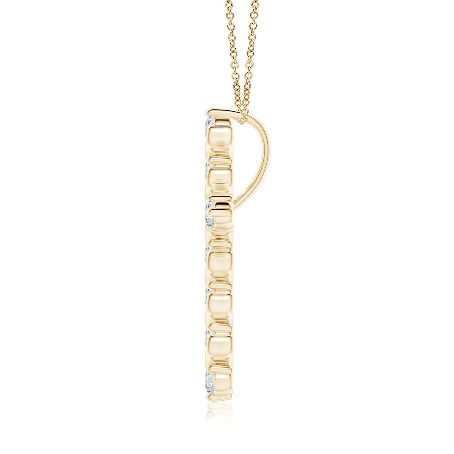 Dieser Kreuzanhänger aus 14-karätigem Gelbgold hat einen Hauch von fließender Eleganz und versprüht femininen Charme. Die Brillanten sind in einer einzigartigen Zacken- und Spangenfassung inmitten wirbelartiger Details befestigt und sorgen für einen