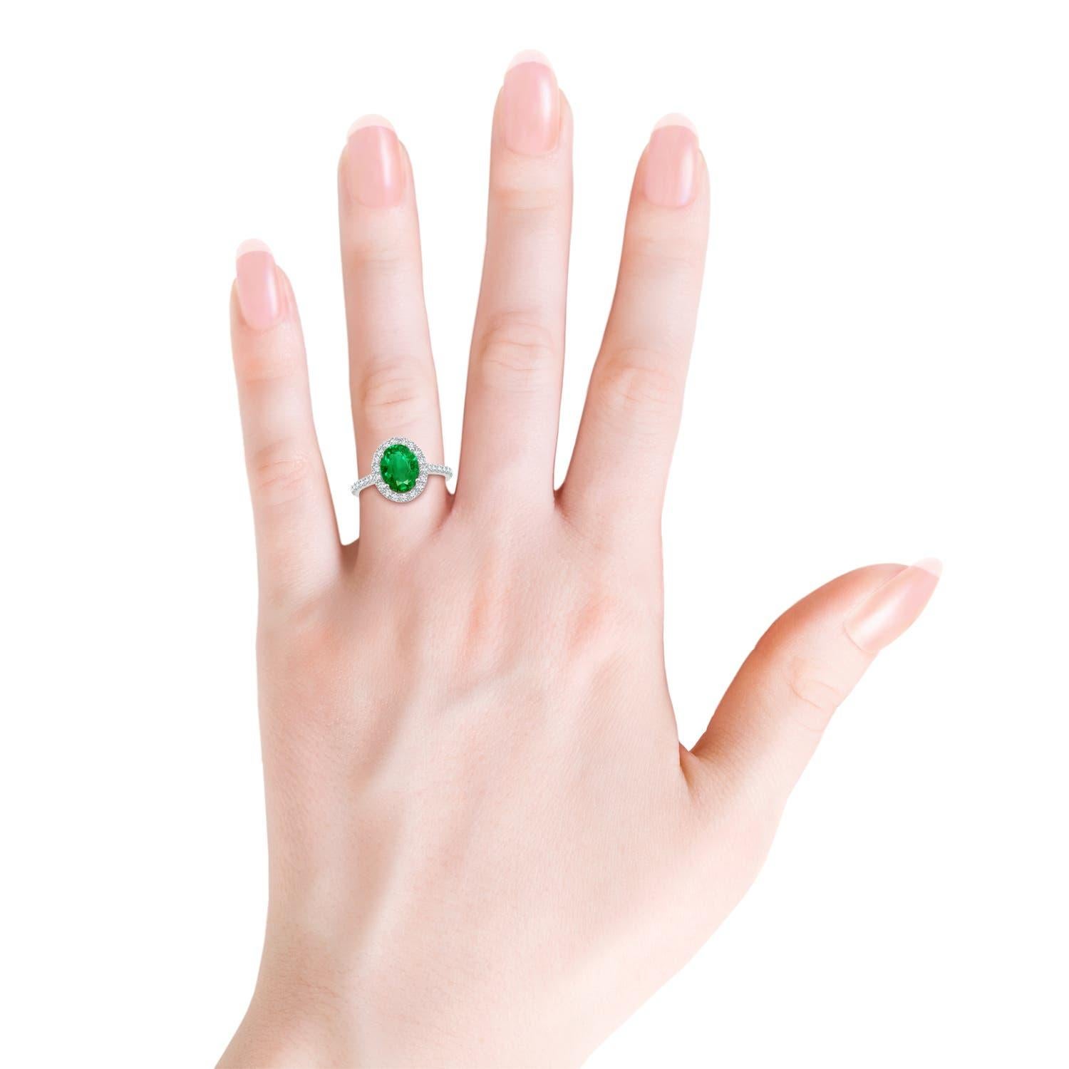 De las mujeres Anillo Angara de oro de 14 quilates con halo de esmeralda natural ovalada de 1,5 quilates engastada con diamantes en venta