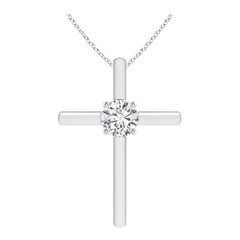 Colgante en forma de cruz con diamante redondo solitario y engastado en oro blanco de 14 quilates