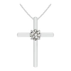 Colgante en forma de cruz con diamante redondo solitario y engastado en oro blanco de 14 quilates
