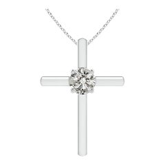 Pendentif croix solitaire en diamant rond serti clos Angara en platine