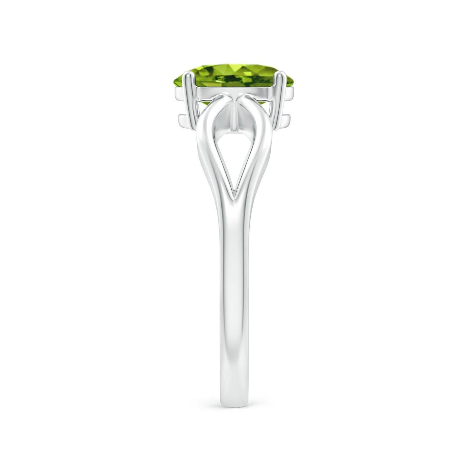 Anillo Angara de oro macizo de 14 quilates con solitario natural engastado de 1,35 quilates de peridoto Corte oval en venta