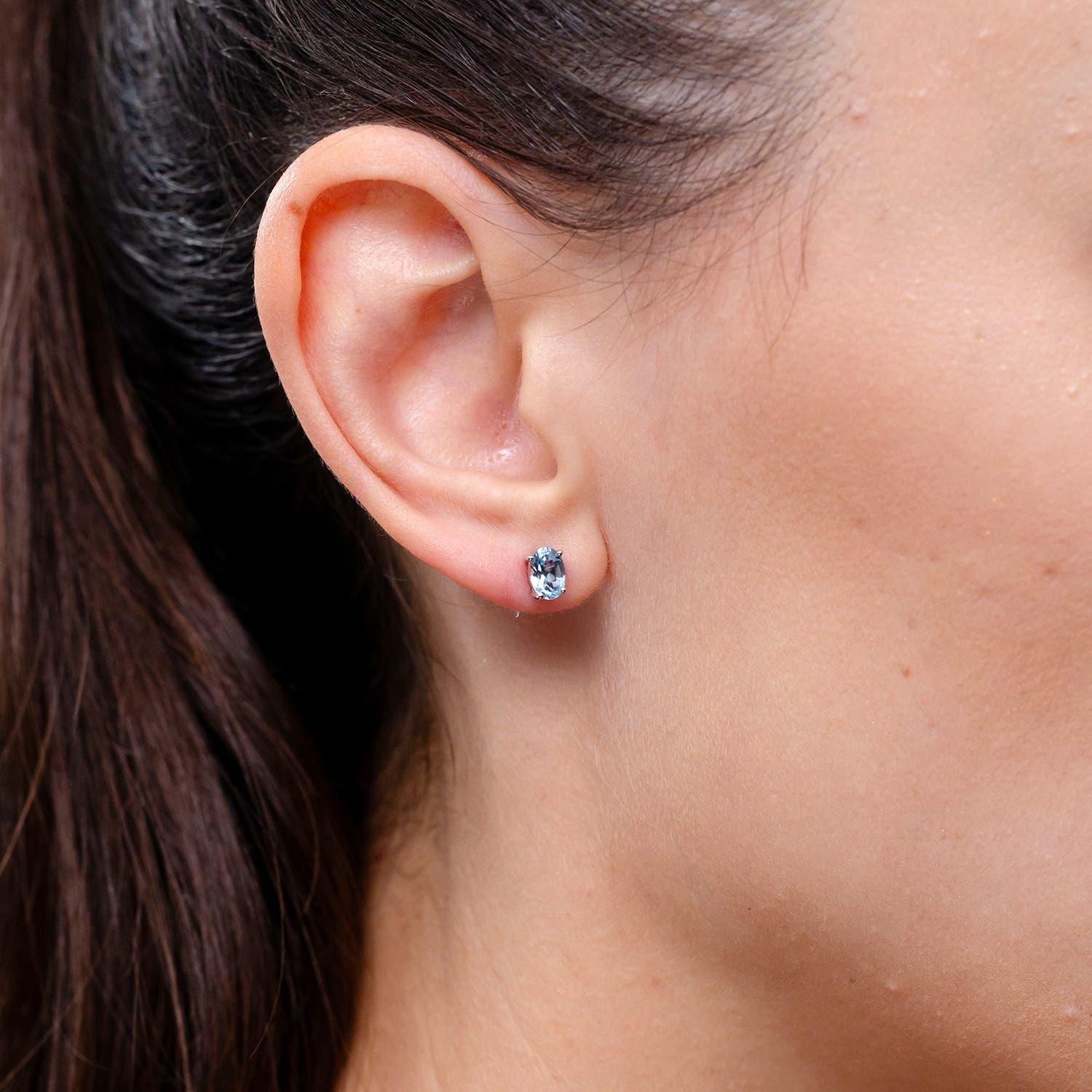 Modern Angara Natural Prong-Set Solitaire Oval Aquamarine Stud Earrings in 14K Gold For Sale