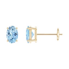 Angara - Boucles d'oreilles en or 14 carats avec aigue-marine ovale solitaire et sertie à l'aide de pierres précieuses