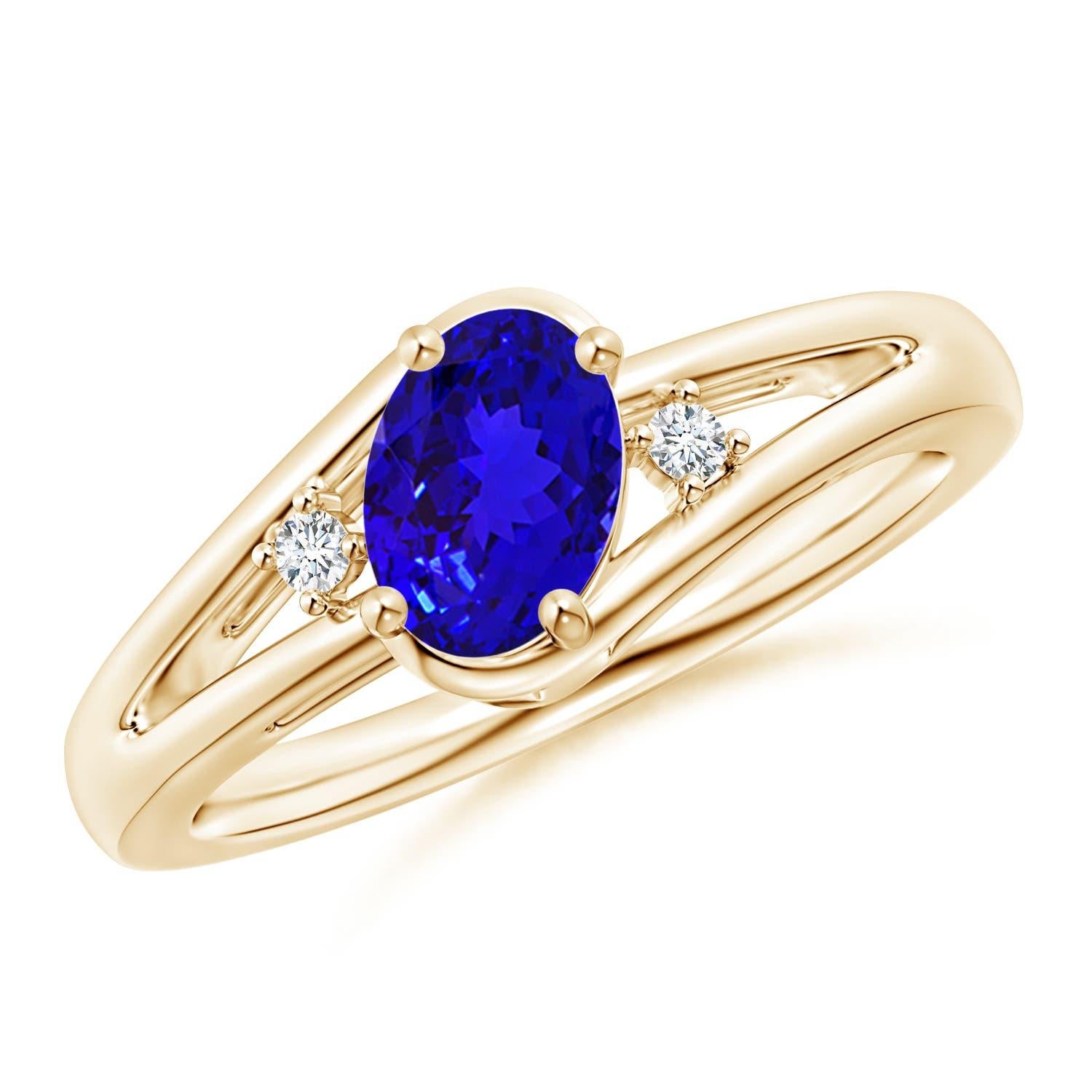 Donna Anello Angara con tanzanite naturale incastonata e diamante con gambo diviso in oro massiccio 14 carati in vendita