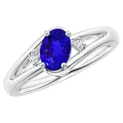 Anello Angara con tanzanite naturale incastonata e diamante con gambo diviso in oro massiccio 14 carati