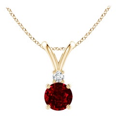ANGARA Natural Round 0.60ct Ruby Solitaire Pendant with Diamond in Yellow Gold
