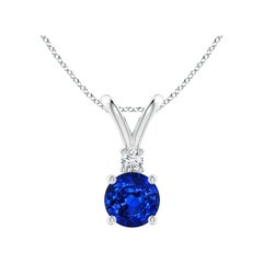 A Silver, pendentif solitaire en saphir bleu naturel rond de 1 ct avec diamant
