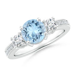 Angara Natural Round 1.12 ct Aquamarine and Diamond Engagement ring in 14K Gold
