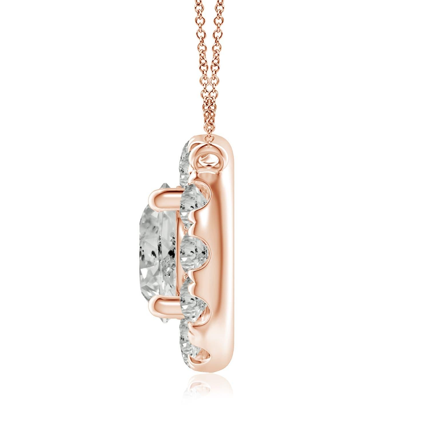 Con un diamante rotondo al centro e un'aureola che lo circonda, questa collana con ciondolo di diamanti è una meraviglia scintillante. Dà l'illusione di una stella scintillante e ha un aspetto stravagante ed elegante. Una collana con ciondolo a
