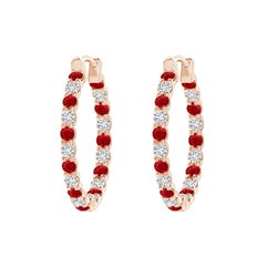 Pendientes de aro Angara de oro macizo de 14 quilates con rubí natural redondo y diamante del revés