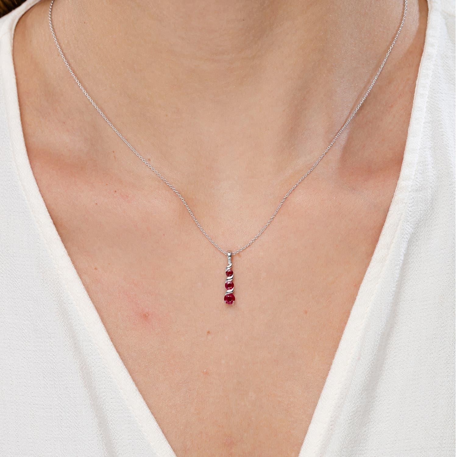 Modern Angara Natural Round Ruby Three Stone Journey Pendant in 14K Solid Gold For Sale