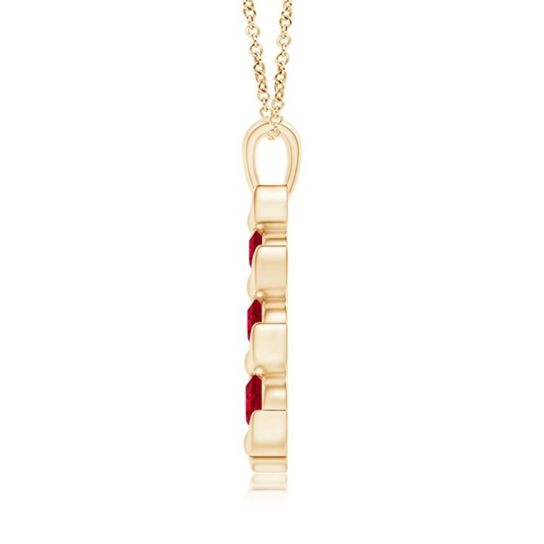 Channel set in an exquisite journey trail, the three graduating round rubies exude their bold and striking red hue. This gorgeous three stone ruby pendant is designed in 14K yellow gold and connects to a lustrous metal bale.
Ruby is the birthstone