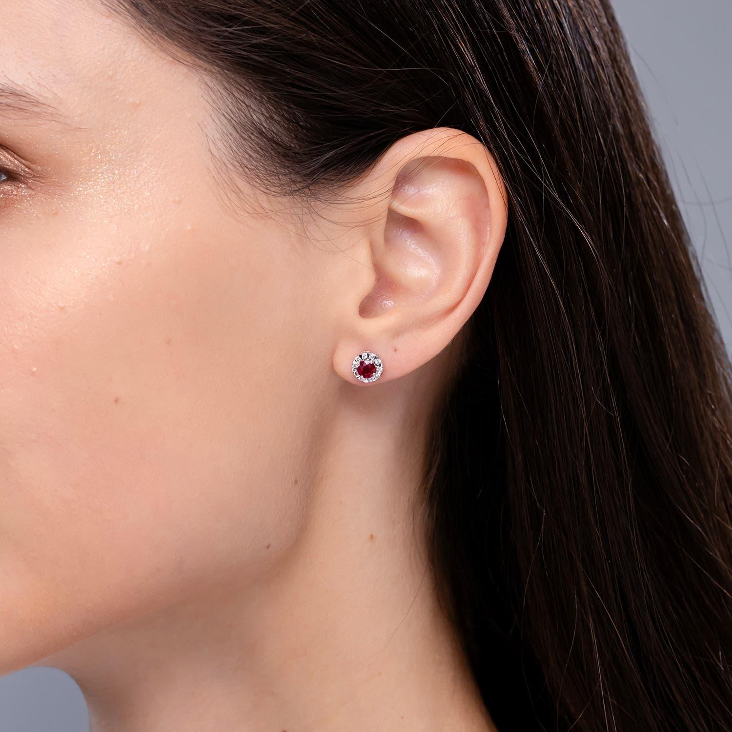 Moderno Angara Natural Ruby Stud Earrings with Bar-Set Diamond Halo in 14K Solid Gold in vendita