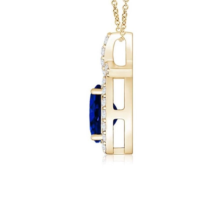 The four-prong set oval sapphire in the center dazzles with its enigmatic blue hue and is encircled by radiant diamonds. Diamond accents adorn the criss cross bale for a spectacular look. Showcasing an elaborate style in 14k yellow gold, this