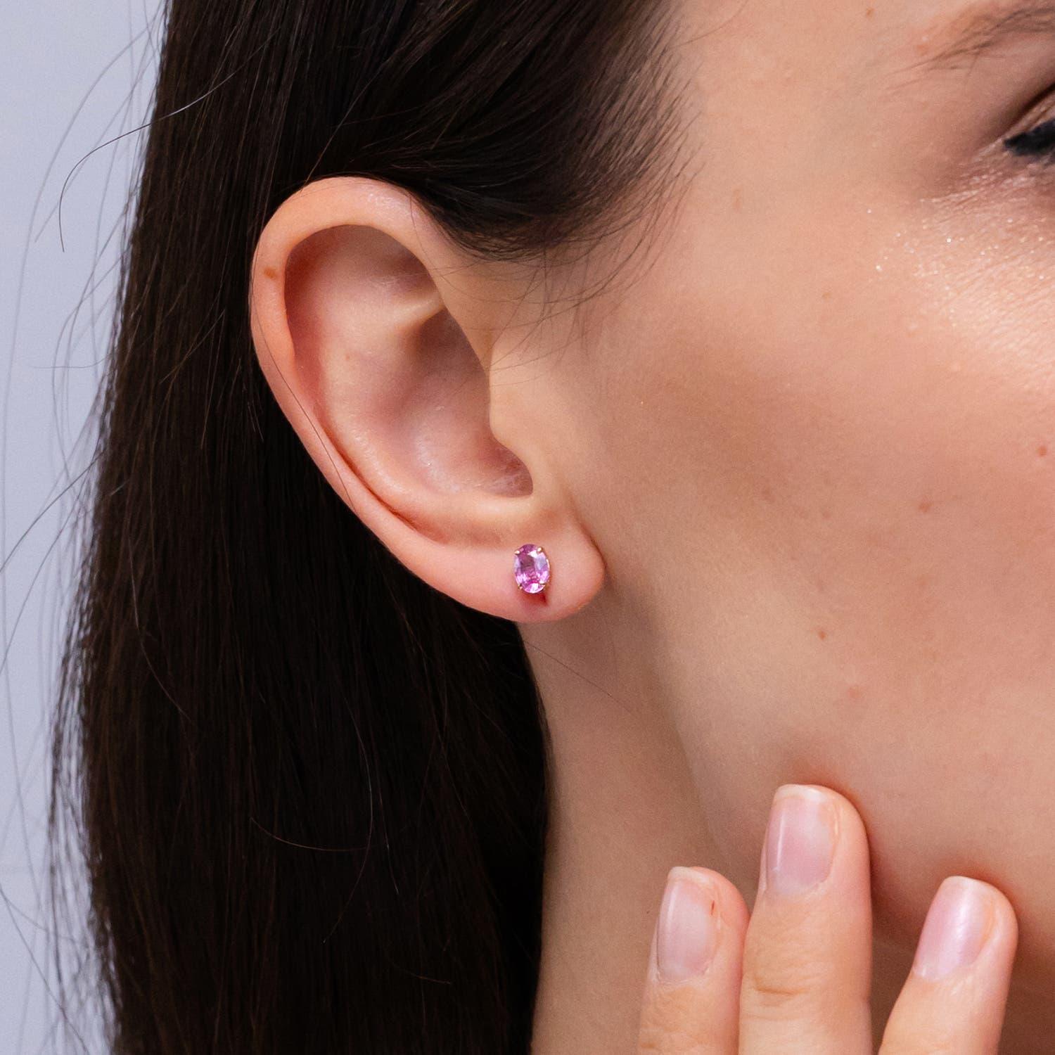 Oval Cut Angara Natural Solitaire Oval 1.1 ct Pink Sapphire Stud Earrings in 14K Gold For Sale