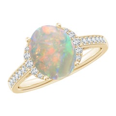 Angara Natural Solitaire Oval 1.45 ct Opal and Diamond Ring in 14K Solid Gold