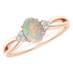Anello Angara con Opale ovale solitario naturale e Trio di diamanti in oro massiccio 14 carati