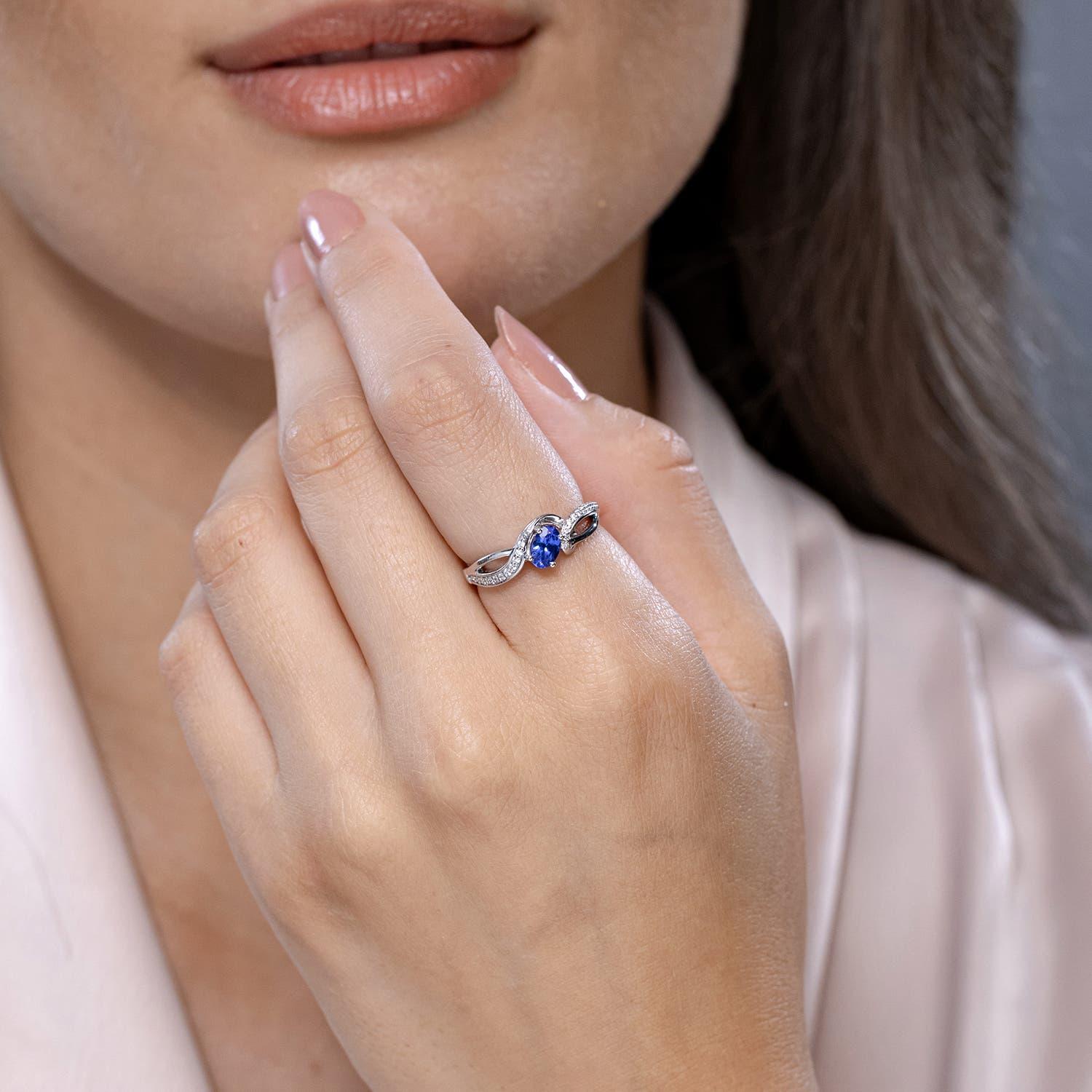 Modern Angara Natural Solitaire Oval Tanzanite Ring with Diamond in 14k Solid Gold For Sale