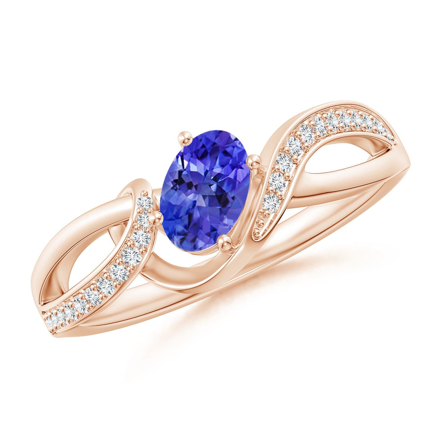 Angara Natural Solitaire Oval Tanzanite Ring with Diamond in 14k Solid Gold For Sale 1