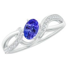 Angara Natural Solitaire Oval Tanzanite Ring with Diamond in 14k Solid Gold