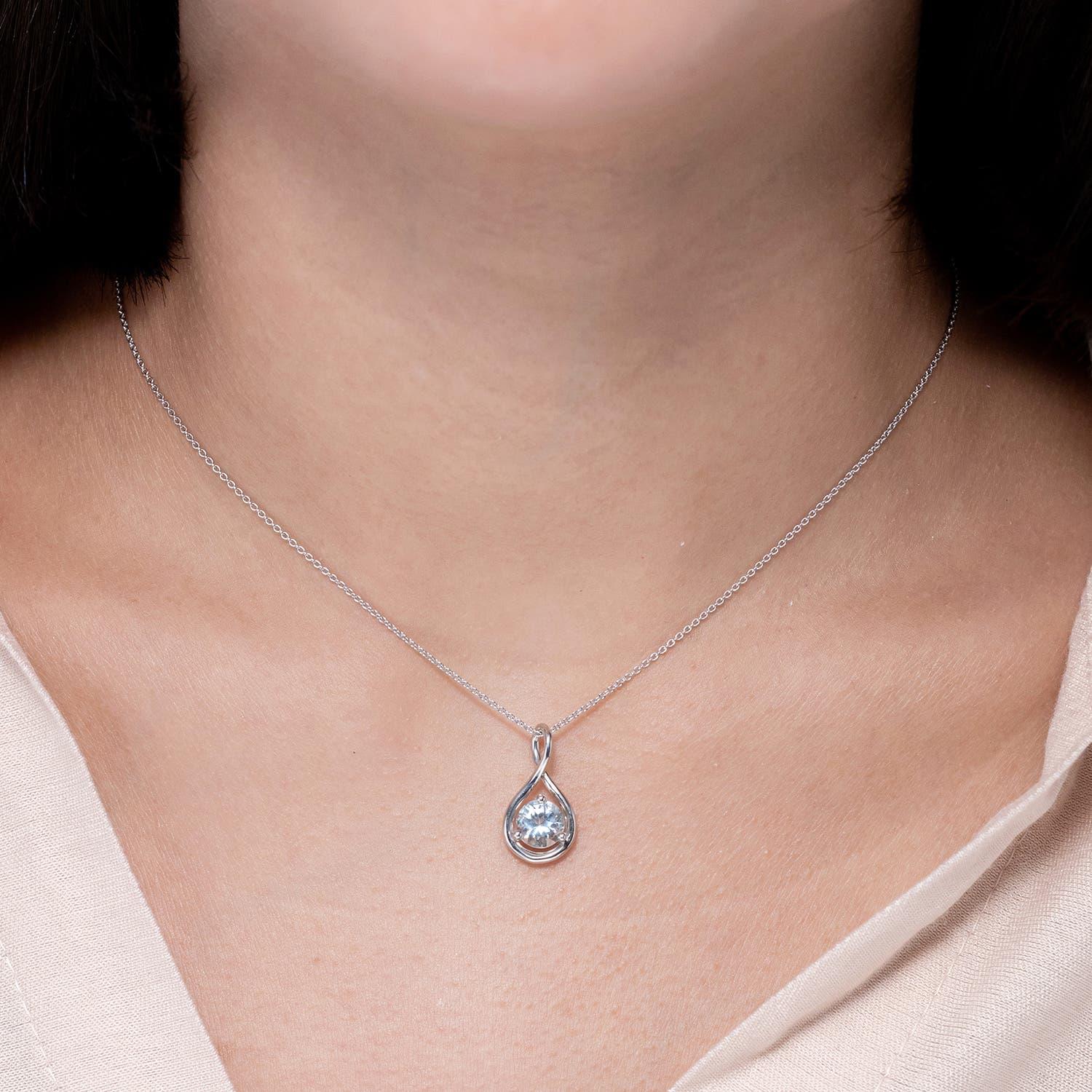 Modern Angara Natural Solitaire Round 1.12 ct Aquamarine Pendant in 14K Solid Gold For Sale
