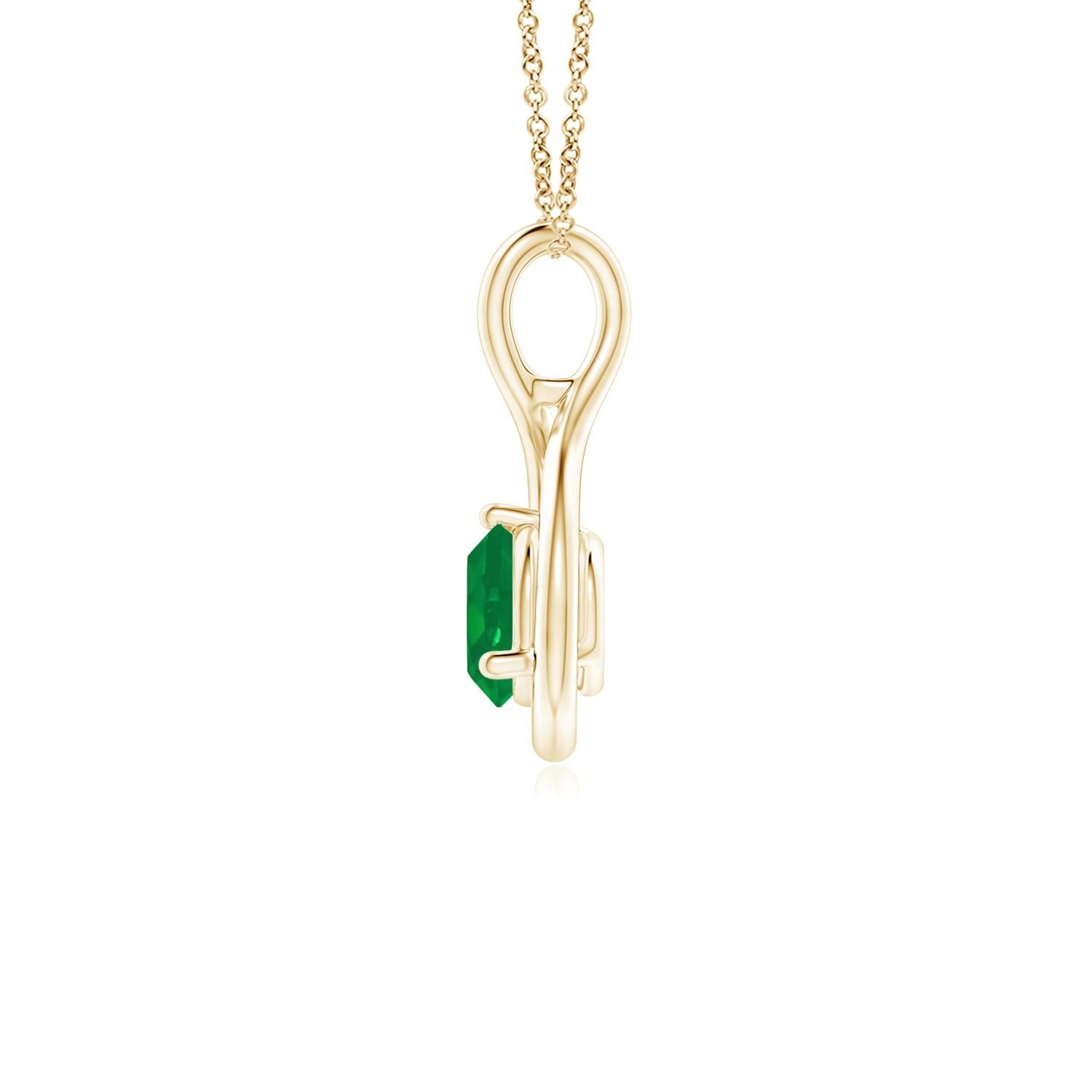 Nichée dans une gracieuse boucle à l'infini, une émeraude solitaire sertie attire le regard par sa teinte verte luxuriante. L'élégance fluide de ce pendentif torsadé infini en or jaune 14k lustré évoque une vibration féminine.
L'émeraude est la