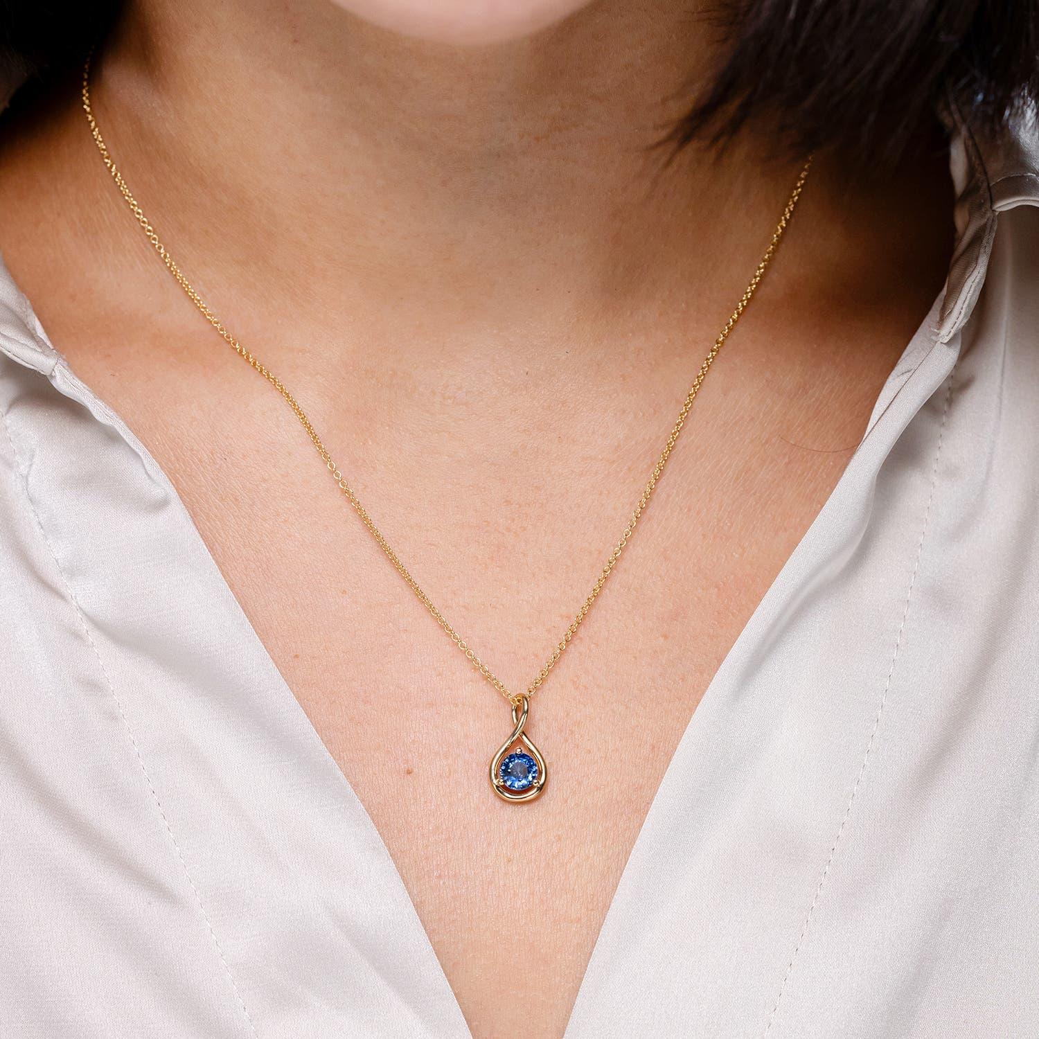 Modern Angara Natural Solitaire Round Sapphire Infinity Twist Pendant in 14K Solid Gold For Sale