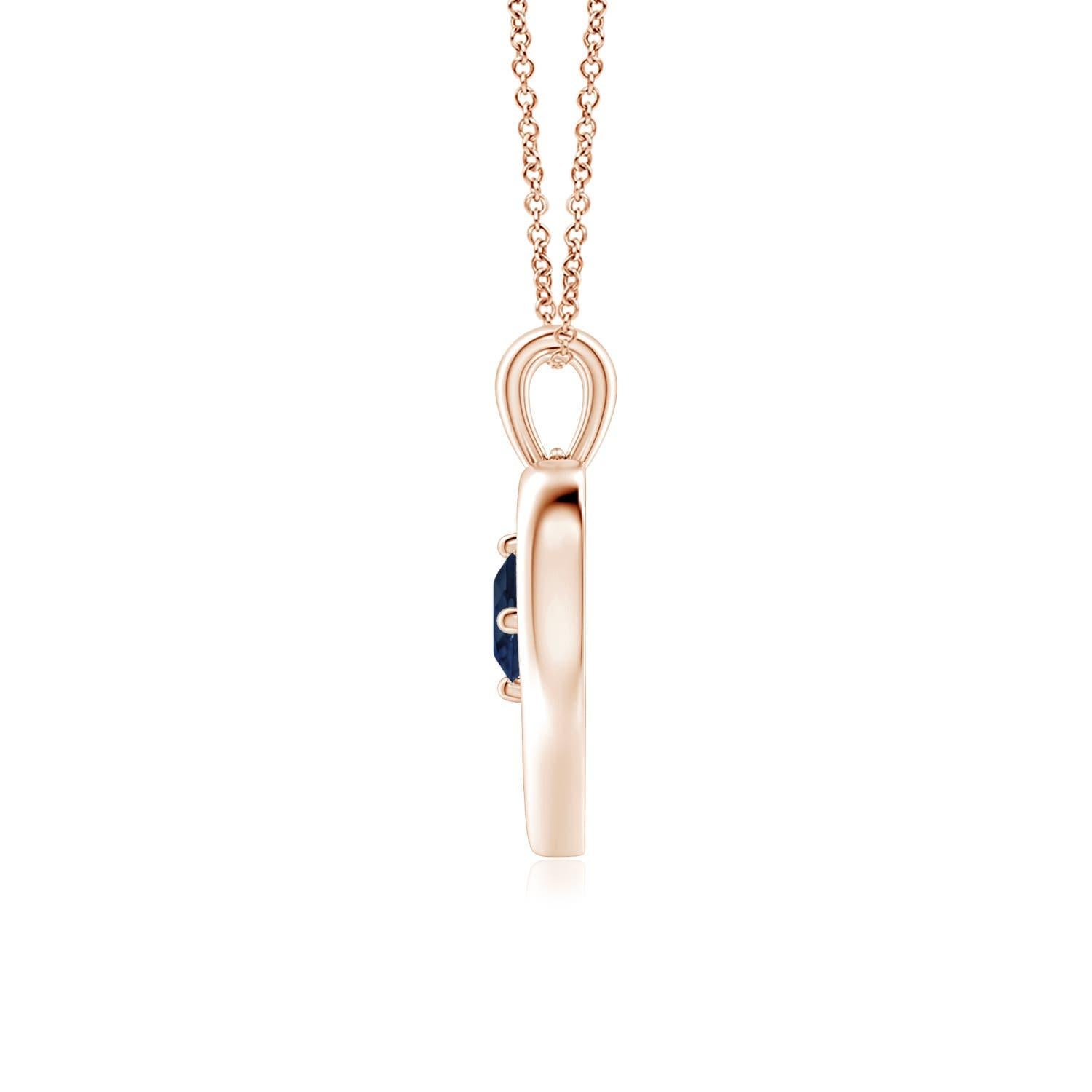 Ce resplendissant pendentif à cœur ouvert en or rose 14k serti de saphirs est à la fois simple et magnifique. L'agréable pierre précieuse bleue semble hypnotisante en combinaison avec le cadre lustré en forme de cœur ouvert.
Le saphir bleu est la